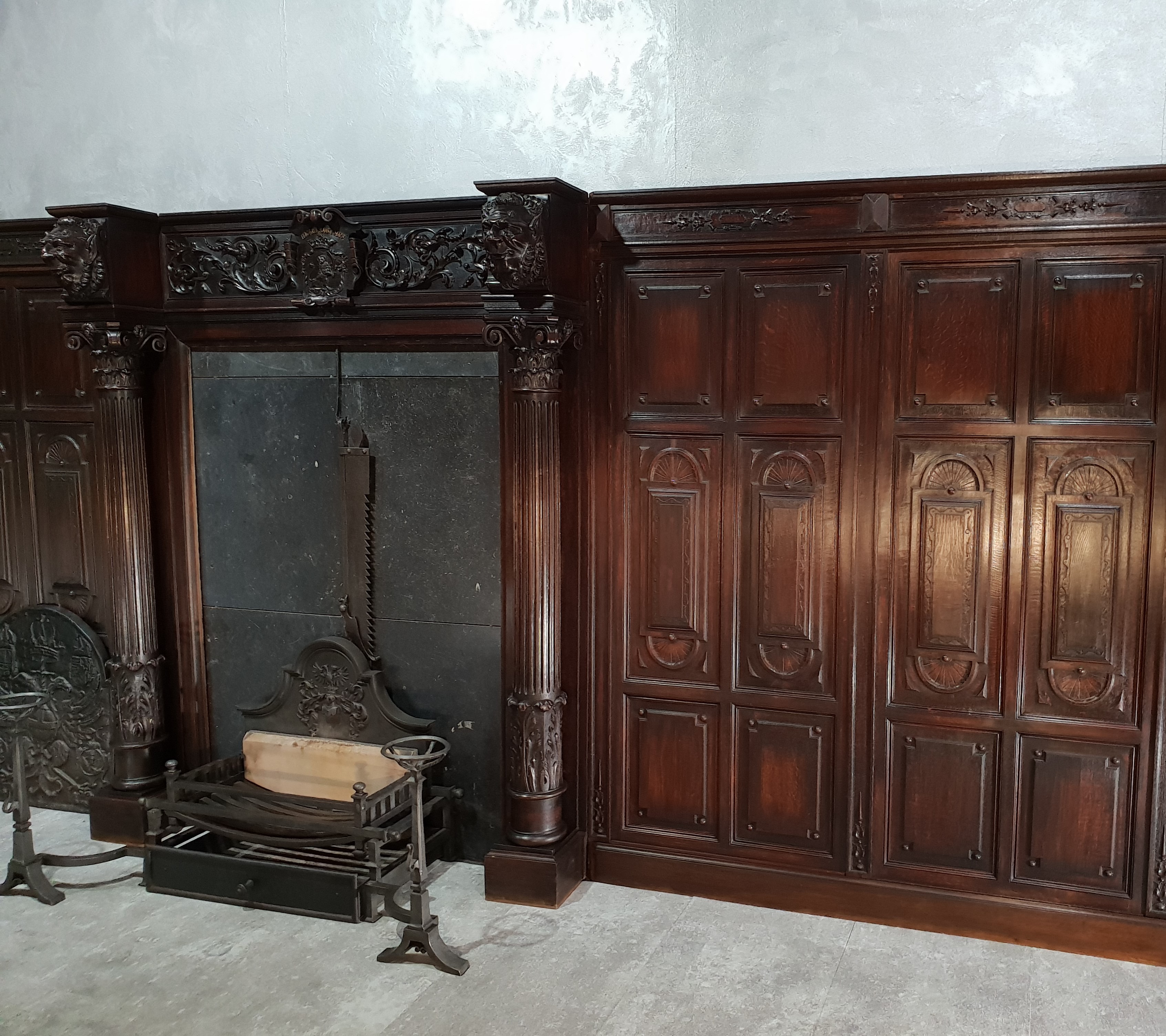Antique Dutch fireplace with wall panels